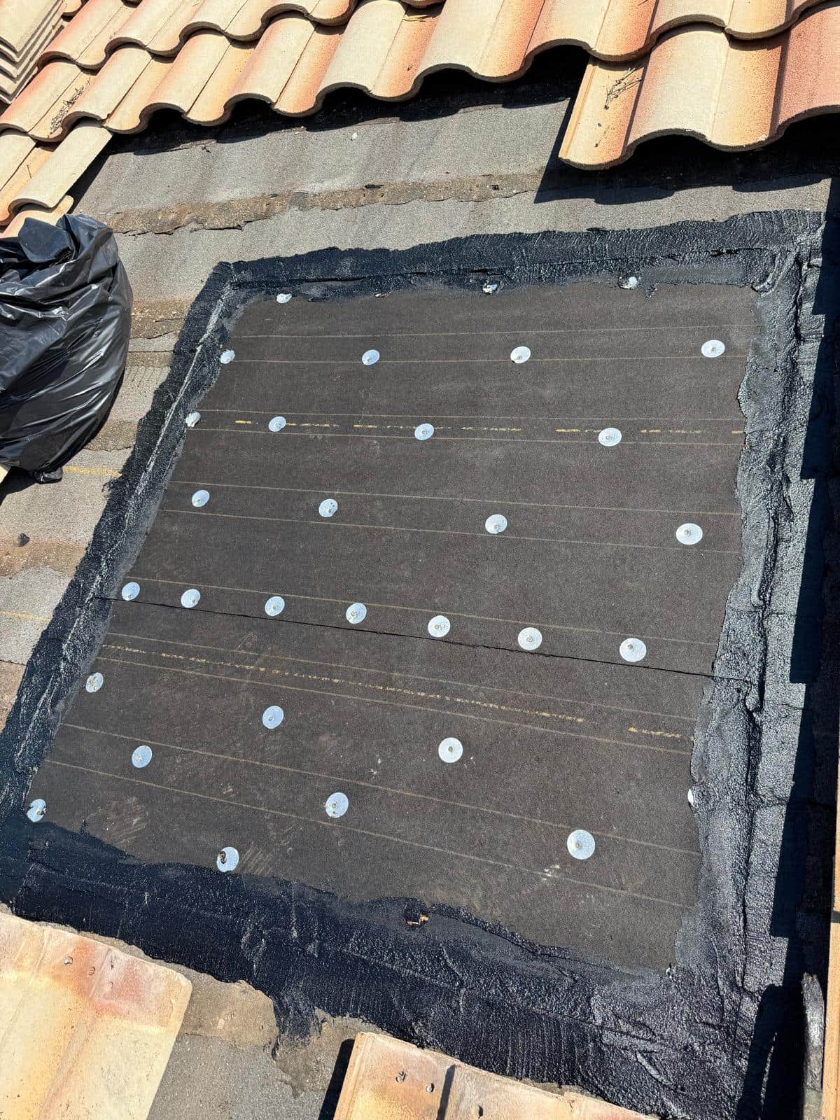 Roof surface prepared for underlayment and tile reinstall